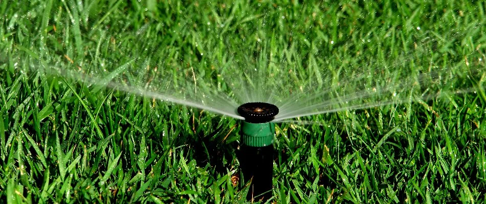 Lawn in Coconut Creek, FL, with a sprinkler irrigation system.