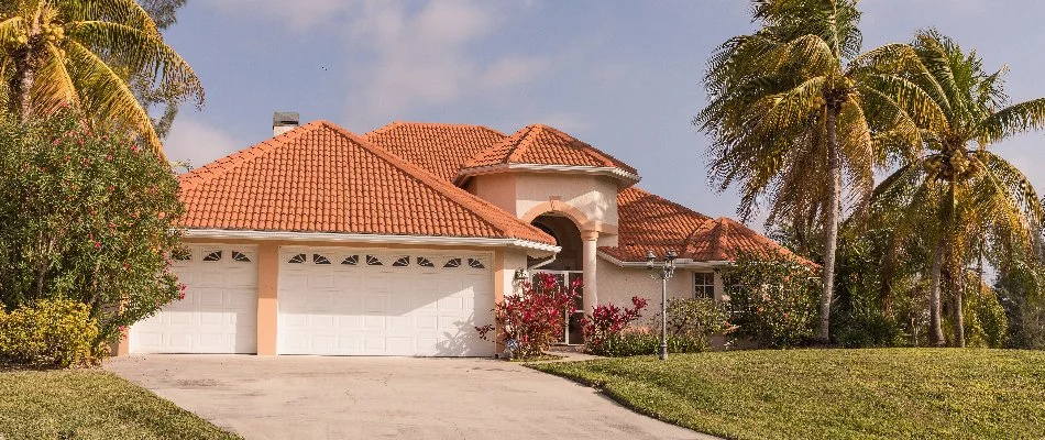 Home with palm trees in Singer Island, FL.